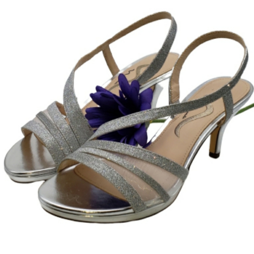 Brand New Nina silver 3 inch glitter heels. Super cute pair of shoes!